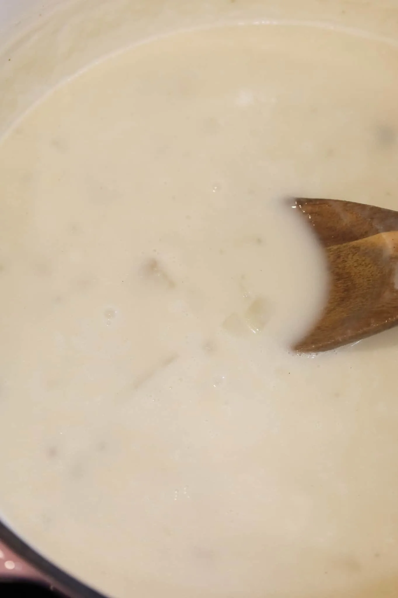 simmering potato soup in a pot