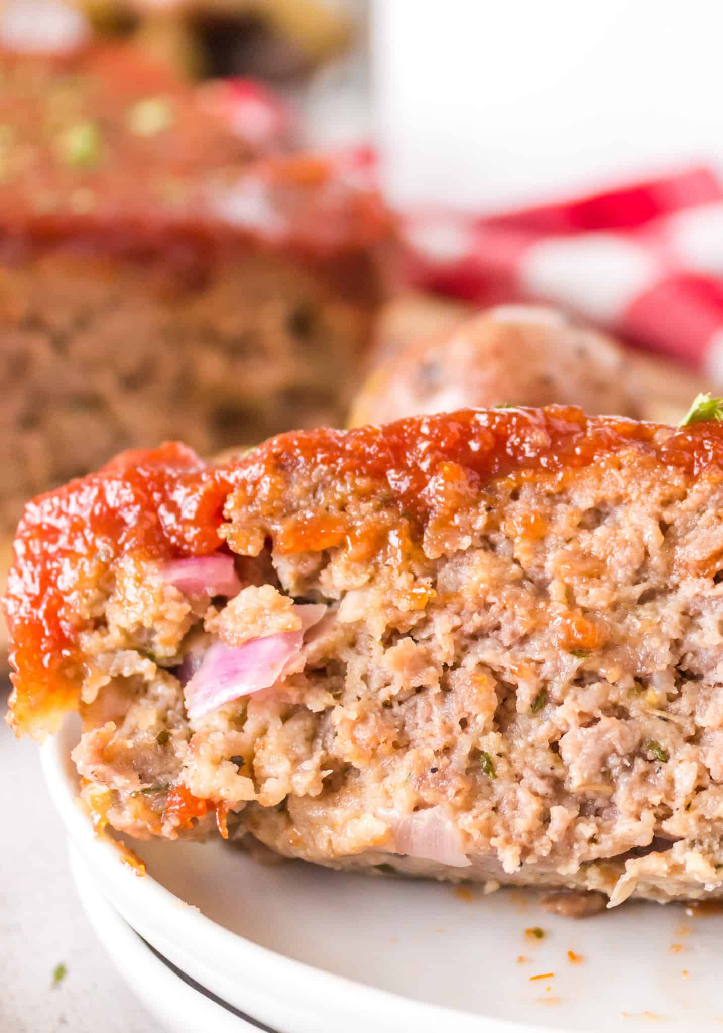 Air Fryer Meatloaf is a simple ground beef meatloaf recipe made with Italian seasoned bread crumbs and topped with a brown sugar ketchup glaze.
