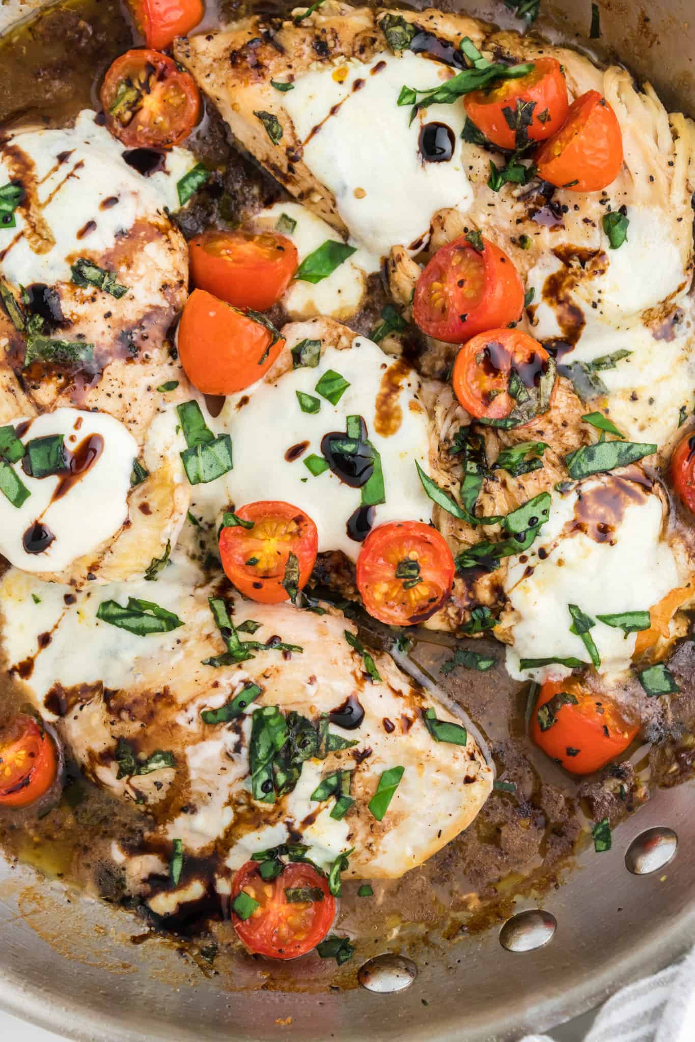 Caprese Chicken is a delicious chicken dish loaded with cherry tomatoes, fresh mozzarella, basil and balsamic vinaigrette.