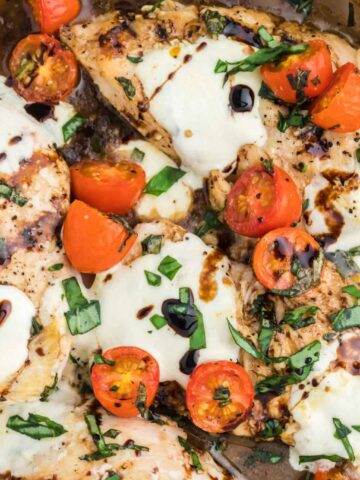 Caprese Chicken is a delicious chicken dish loaded with cherry tomatoes, fresh mozzarella, basil and balsamic vinaigrette.