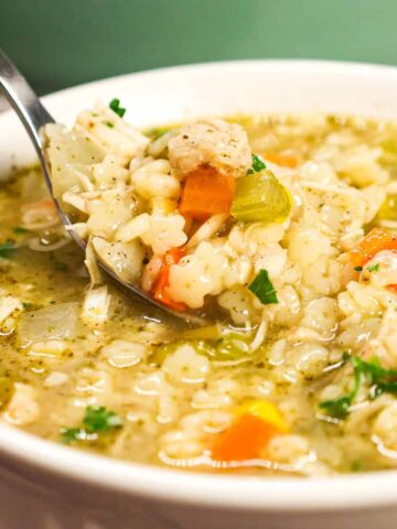 Chicken and Stars Soup is a hearty soup recipe loaded with chunks of chicken, onions, carrots, celery, corn and star shaped pasta.