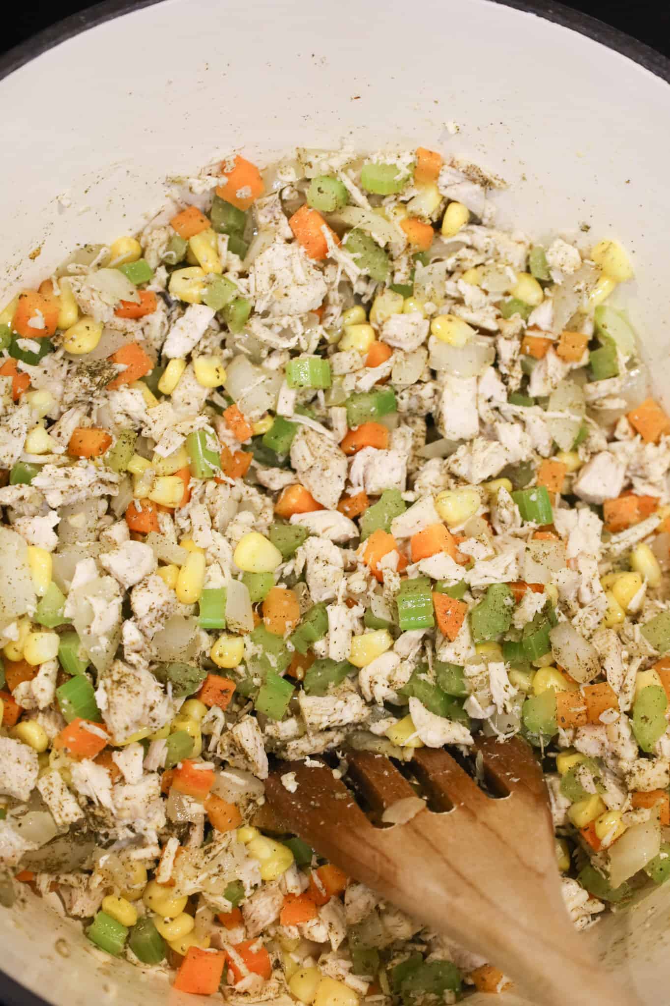 chicken and veggie mixture cooking in a pot