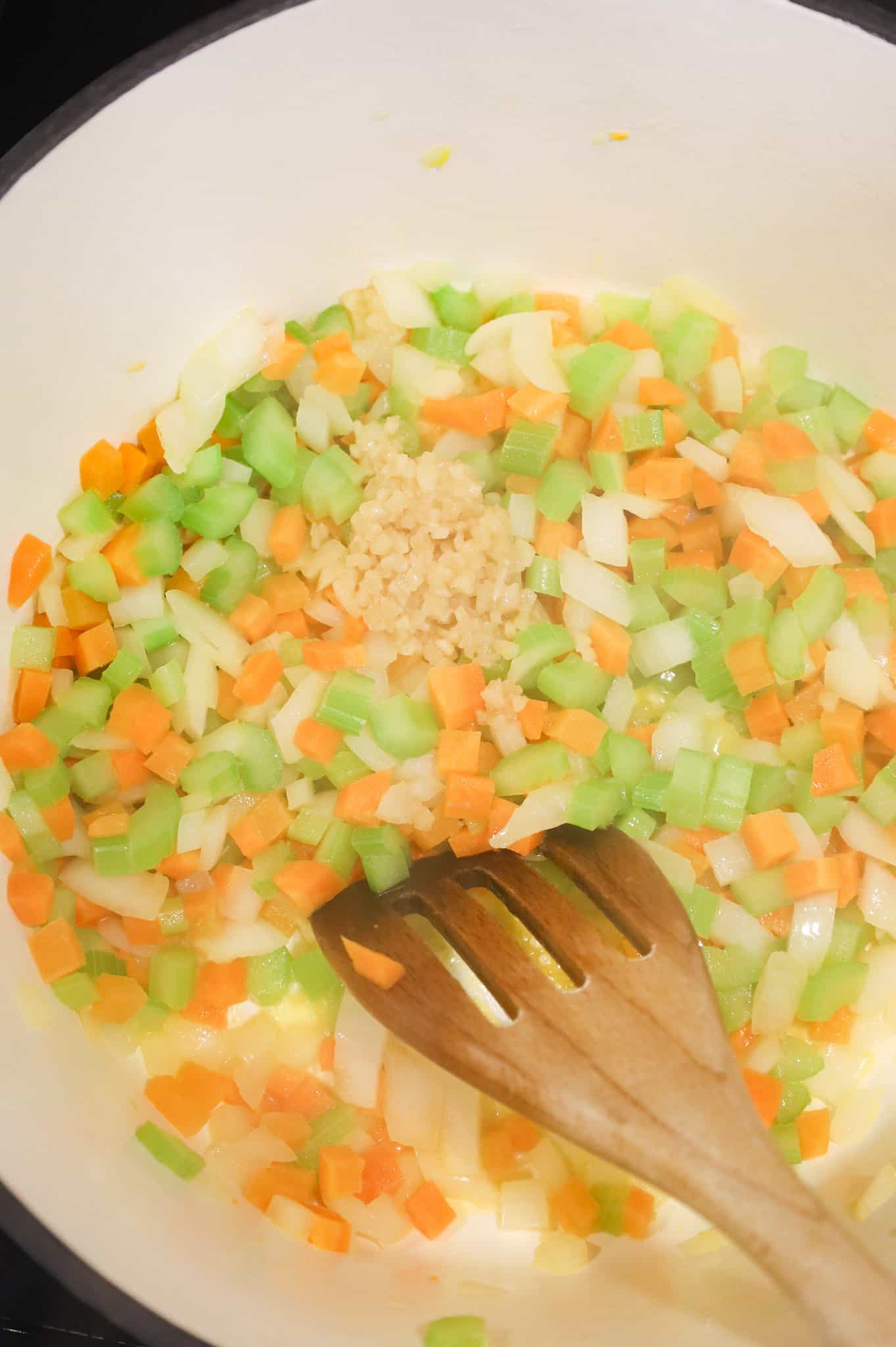 minced garlic added to pot with diced vegetables