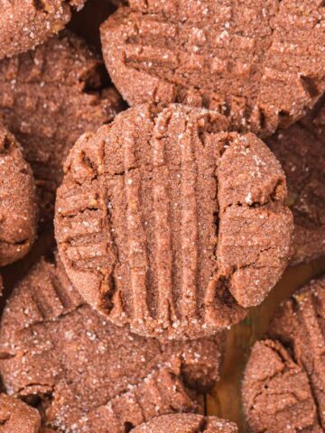 Chocolate Peanut Butter Cookies are a simple and delicious cookie recipe using peanut butter cookie mix, cocoa powder, an egg, butter and topped with a sprinkle of sugar.