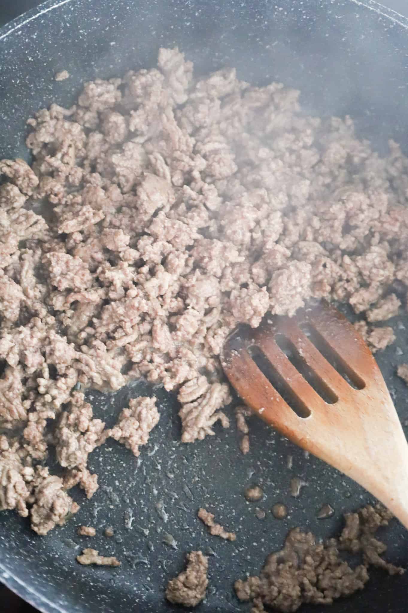 cooked ground beef in a skillet