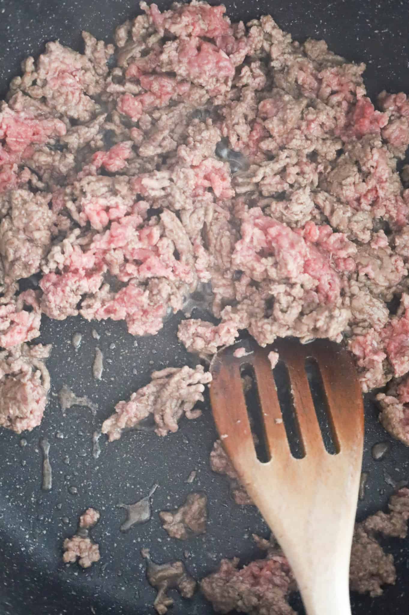 ground beef cooking in a skillet