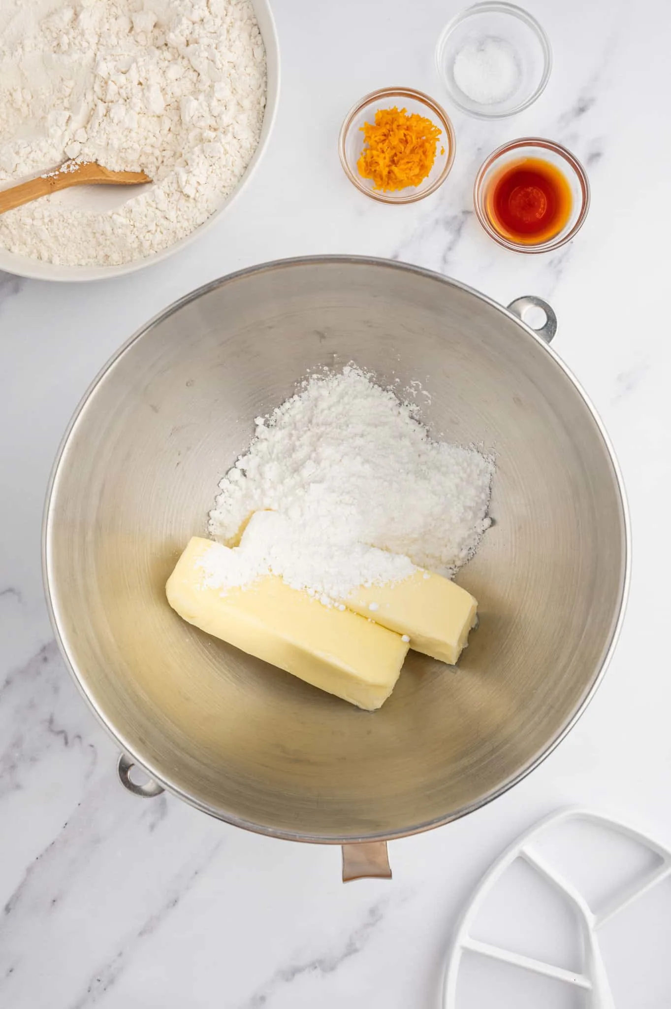 softened butter and confectioner's sugar in a bowl
