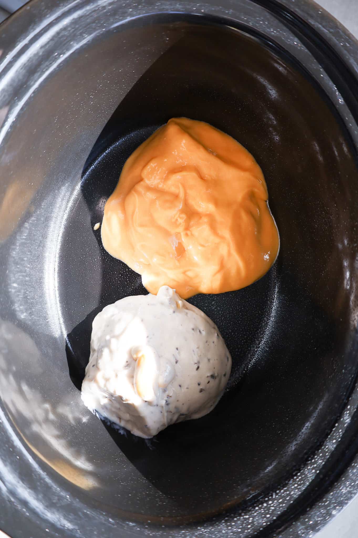 condensed cheddar soup and mushroom soup in a crock pot