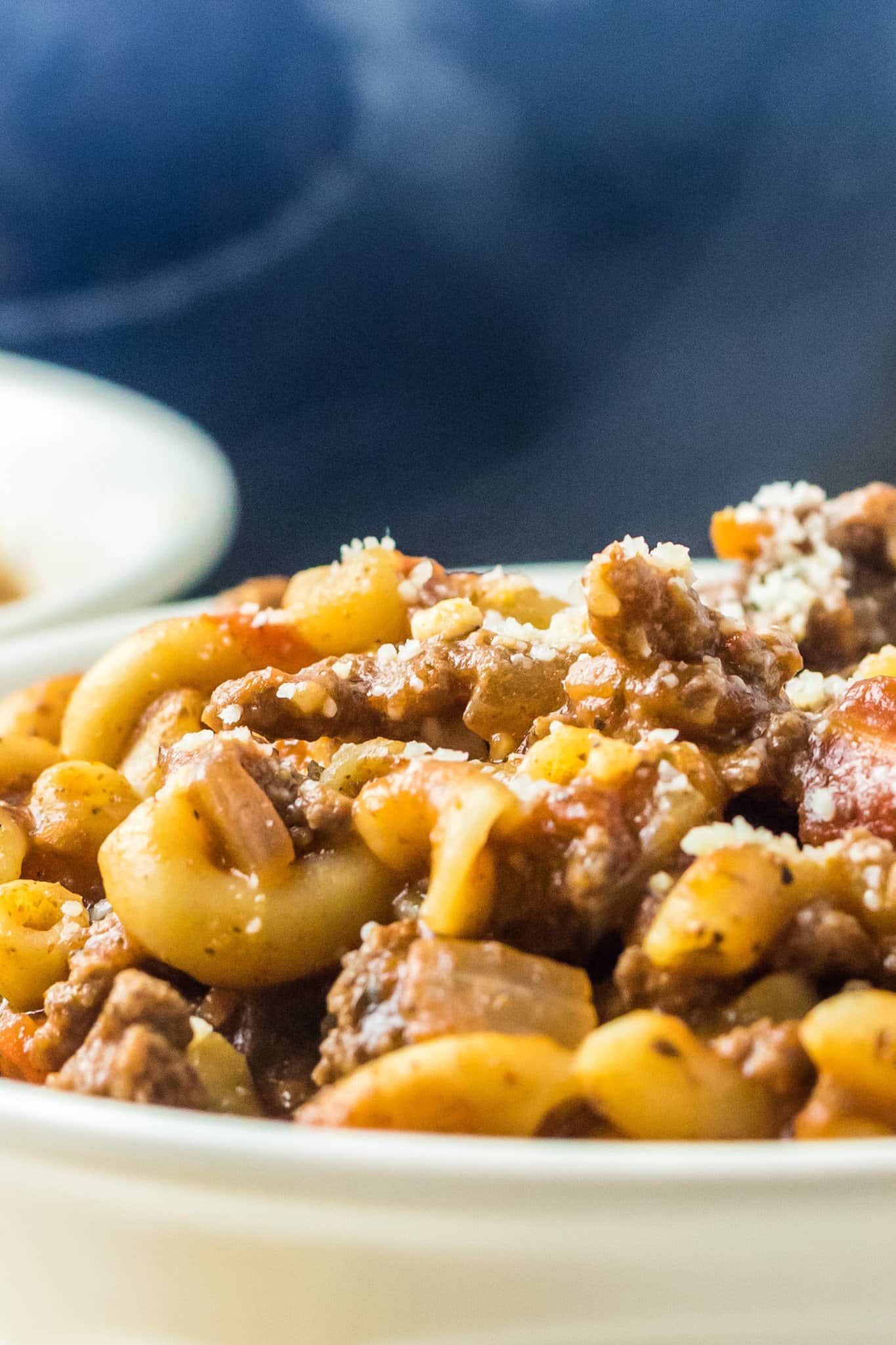 Old Fashioned Goulash is a hearty macaroni recipe loaded with ground beef, diced tomatoes and green peppers all tossed in a tomato sauce seasoned with paprika.