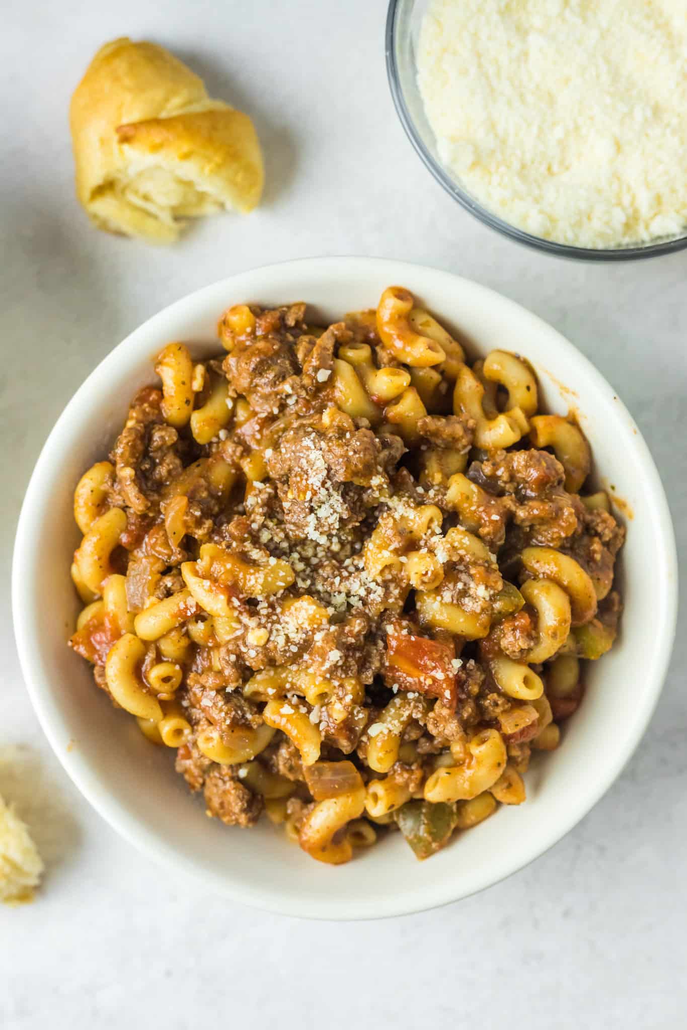 Old Fashioned Goulash is a hearty macaroni recipe loaded with ground beef, diced tomatoes and green peppers all tossed in a tomato sauce seasoned with paprika.