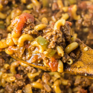 Old Fashioned Goulash is a hearty macaroni recipe loaded with ground beef, diced tomatoes and green peppers all tossed in a tomato sauce seasoned with paprika.
