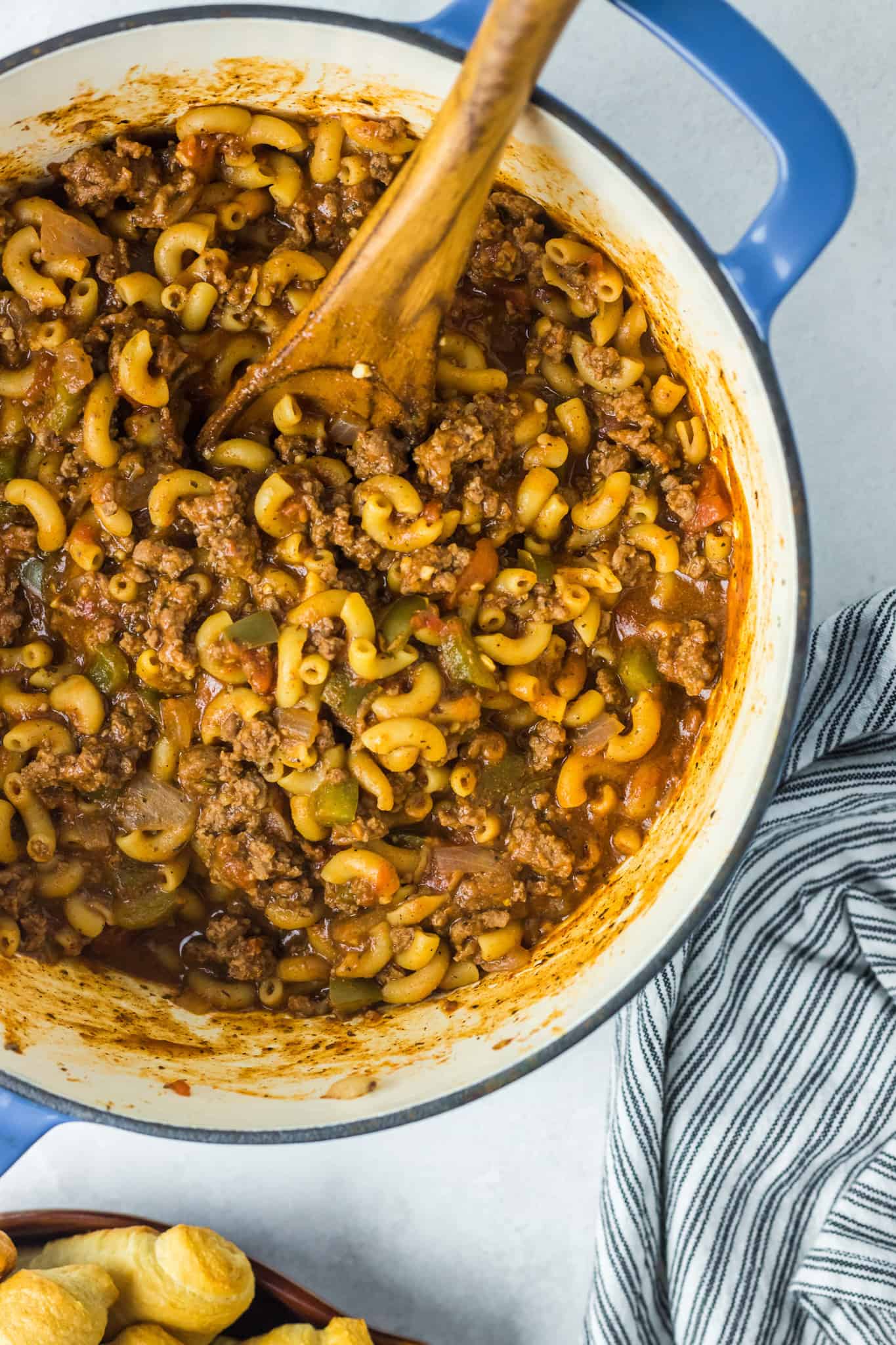 Old Fashioned Goulash is a hearty macaroni recipe loaded with ground beef, diced tomatoes and green peppers all tossed in a tomato sauce seasoned with paprika.