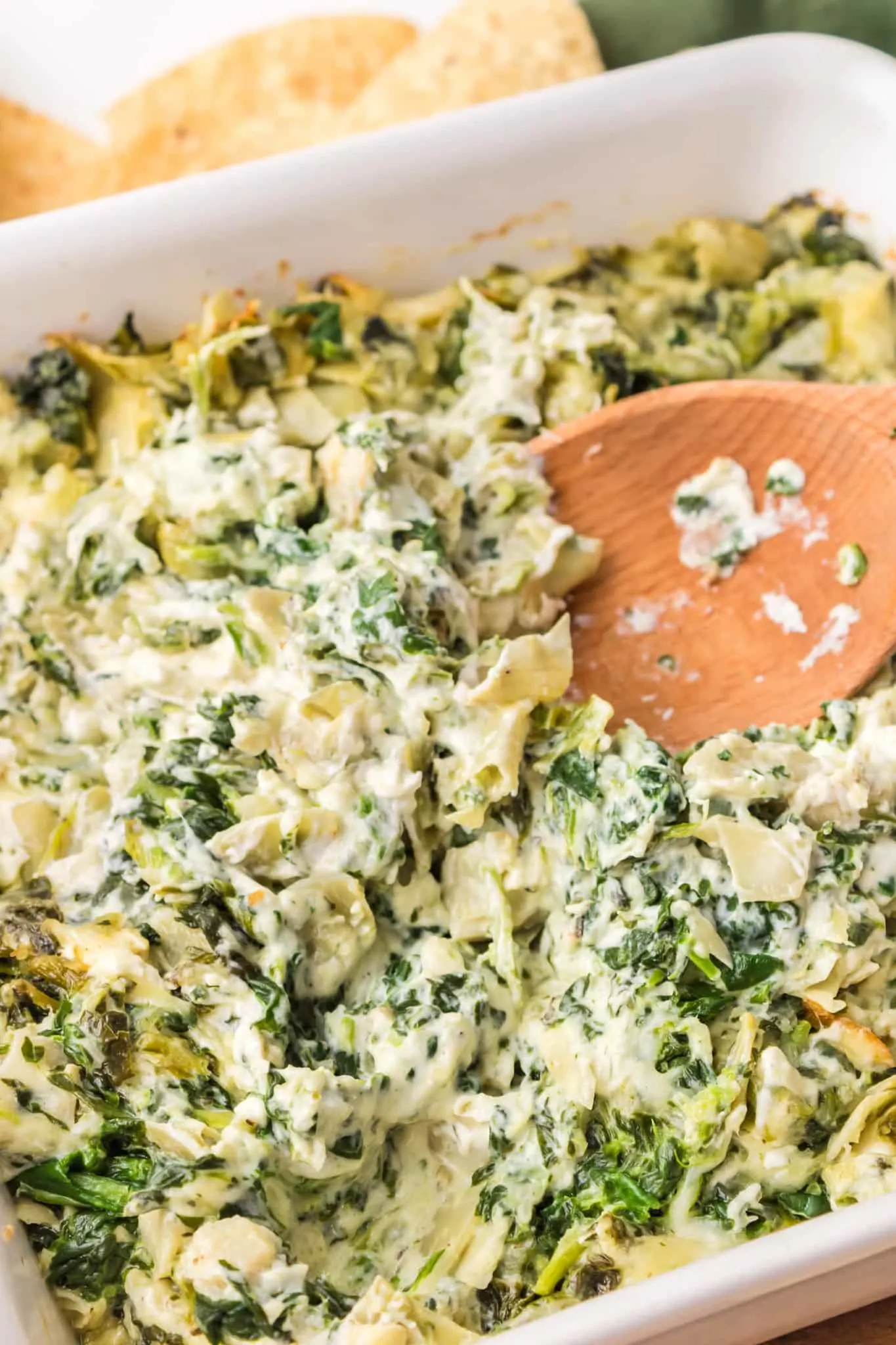 Spinach Artichoke Dip is a creamy baked dip recipe loaded with chopped artichoke hearts, spinach, cream cheese, parmesan and mozzarella.