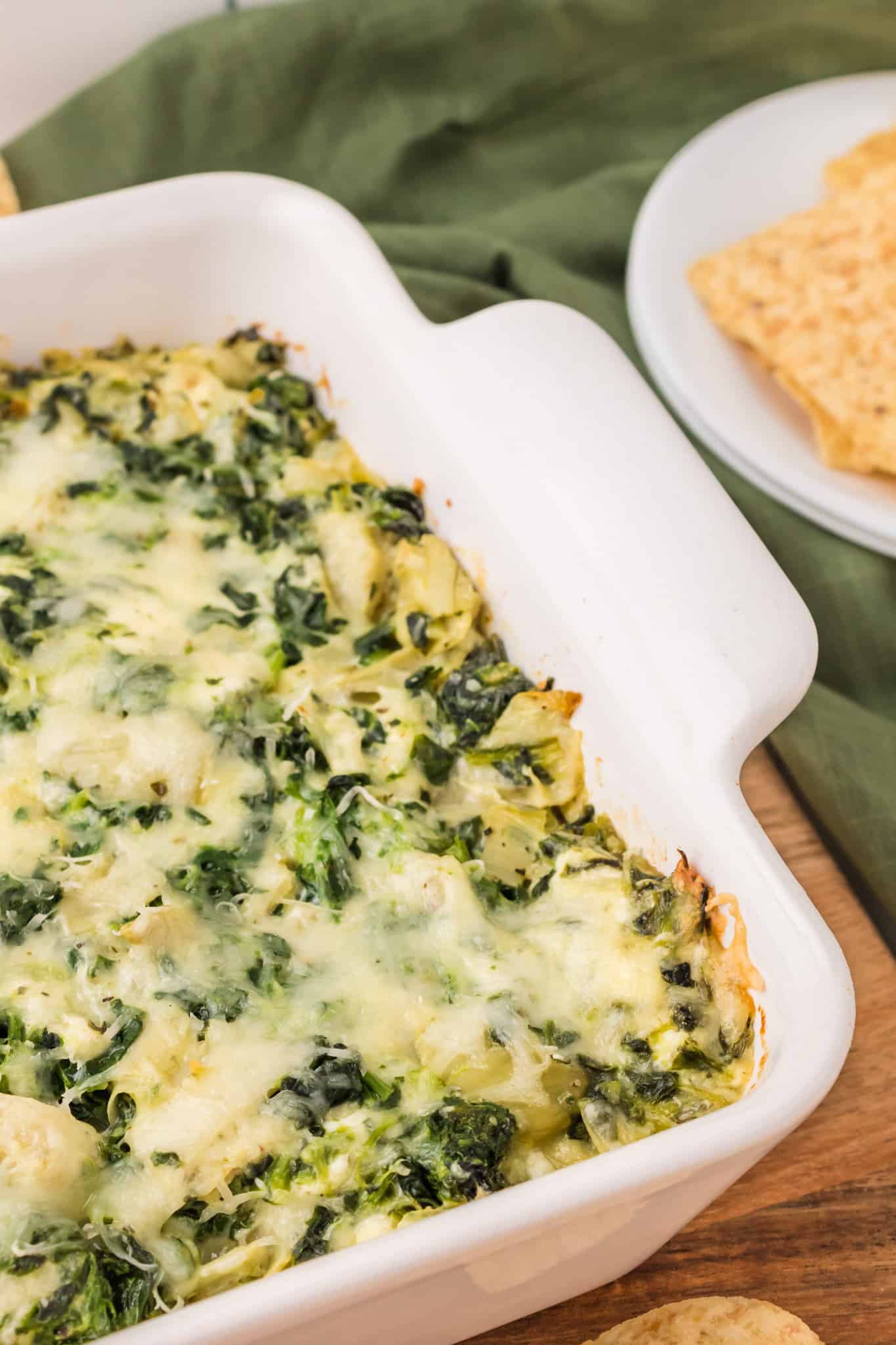 Spinach Artichoke Dip is a creamy baked dip recipe loaded with chopped artichoke hearts, spinach, cream cheese, parmesan and mozzarella.