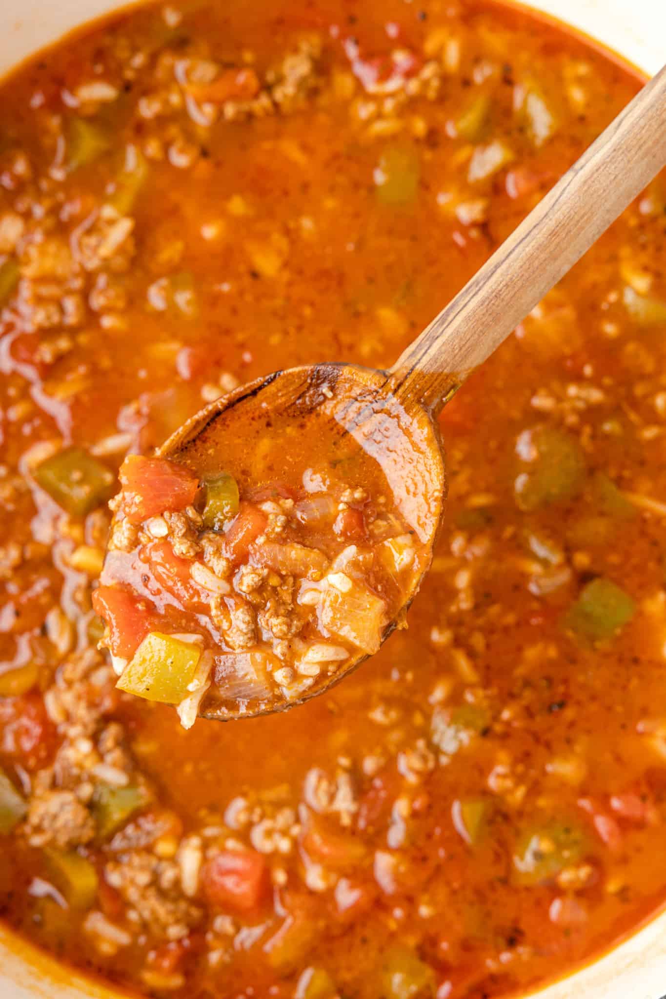 Stuffed Pepper Soup is a hearty soup recipe loaded with ground beef, diced green bell peppers, diced tomatoes and rice.