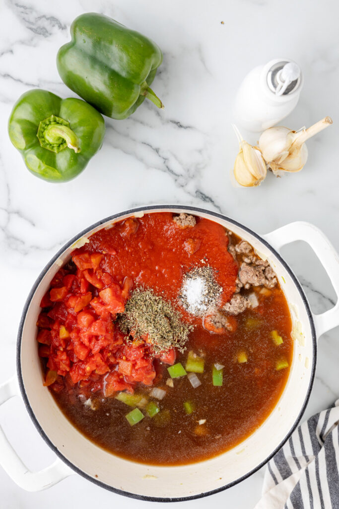 salt, pepper and Italian seasoning add to pot with diced tomatoes, tomato sauce and beef broth