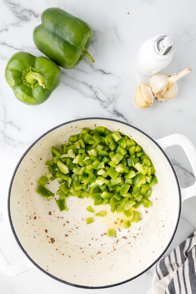 diced green peppers in a pot