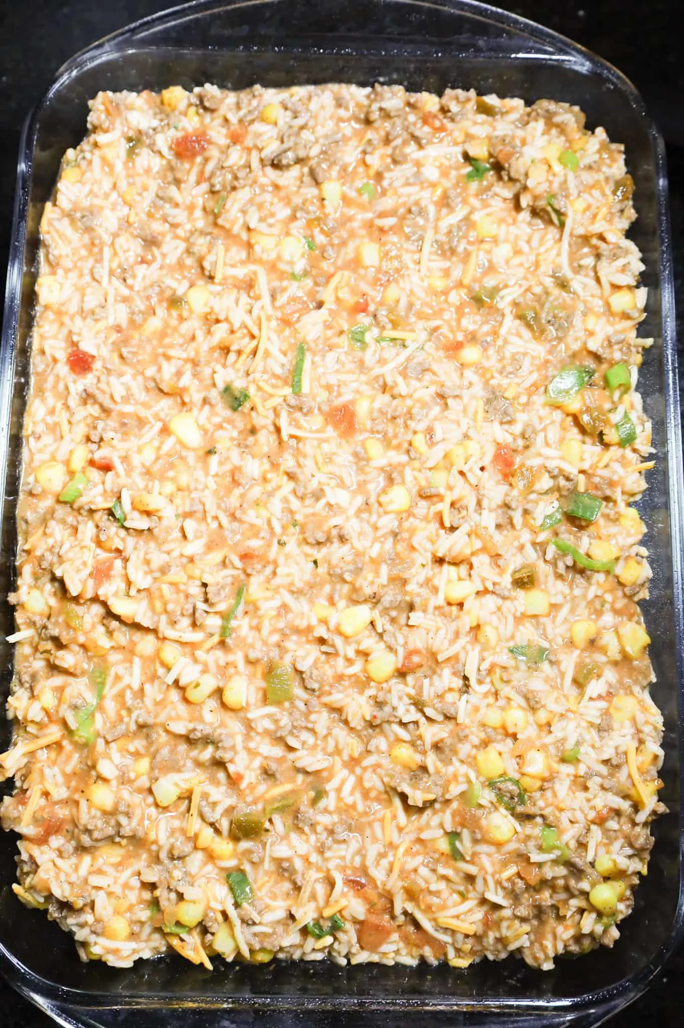 ground beef and rice mixture in a baking dish