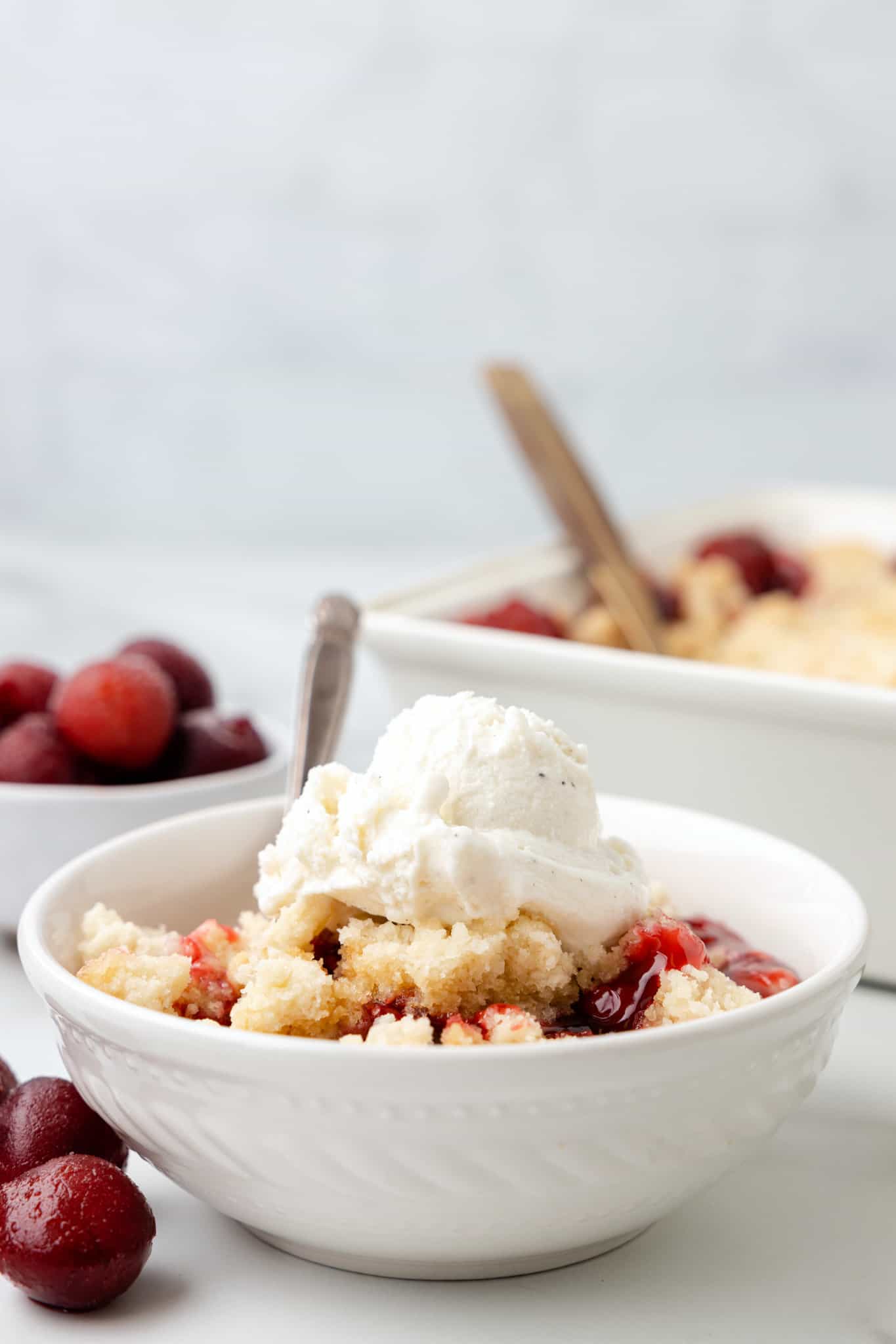 Cherry Cobbler is an easy three ingredient dessert recipe using canned cherry pie filling, sugar cookie mix and butter.