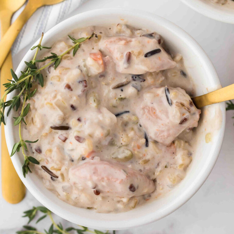 Chicken and Wild Rice Soup is a hearty and creamy soup recipe loaded with chunks of chicken, wild rice, carrots, celery, onions and fresh thyme.
