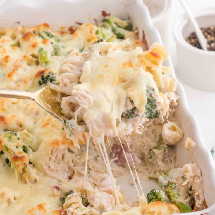 Chicken Broccoli Casserole is a hearty casserole recipe loaded with rotini pasta, shredded chicken and broccoli florets all baked in a creamy sauce and topped with cheddar cheese.