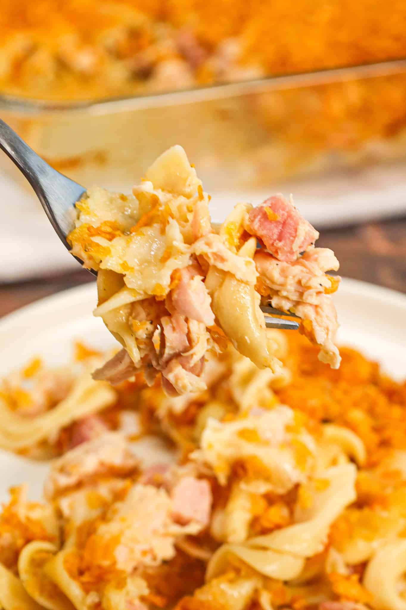 Chicken Cordon Bleu Casserole is an easy casserole recipe loaded with egg noodles, chopped  ham, shredded chicken, cream of chicken soup and topped with Swiss cheese and crumbled cornflakes.