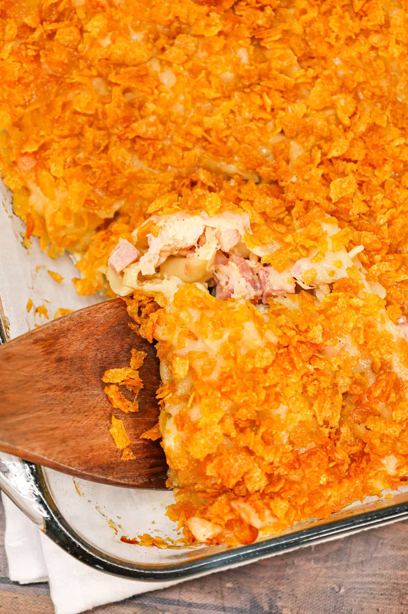 Chicken Cordon Bleu Casserole is an easy casserole recipe loaded with egg noodles, chopped  ham, shredded chicken, cream of chicken soup and topped with Swiss cheese and crumbled cornflakes.