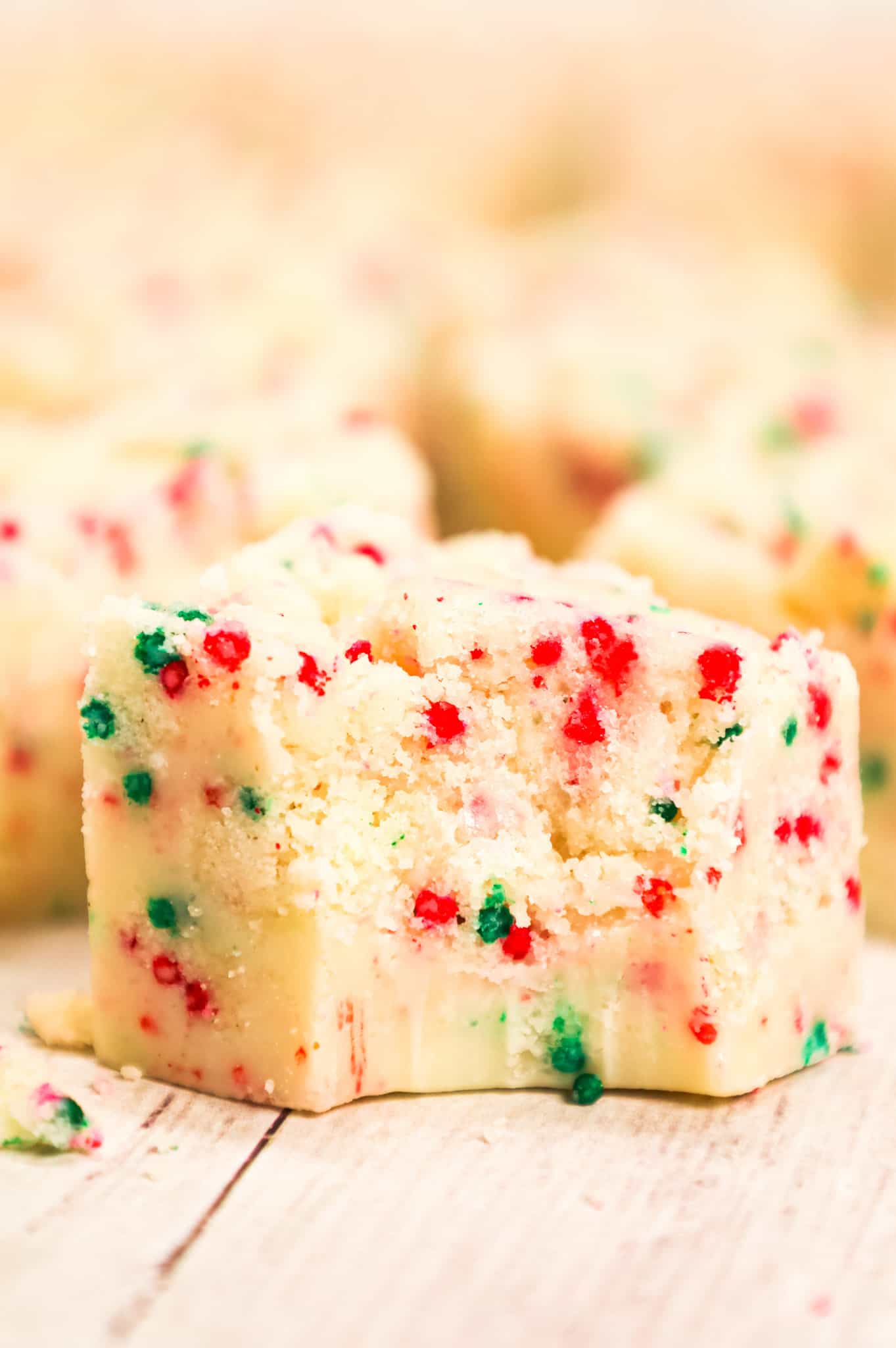 Christmas Sugar Cookie Fudge is a delicious holiday treat loaded with baked sugar cookie crumble, sprinkles, sweetened condensed milk and white chocolate chips.