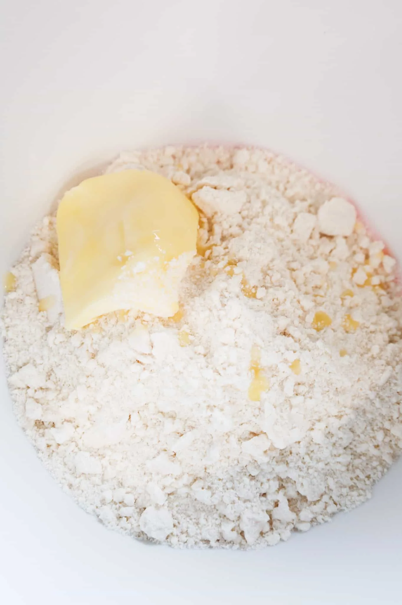 softened butter added to bowl with sugar cookie mix