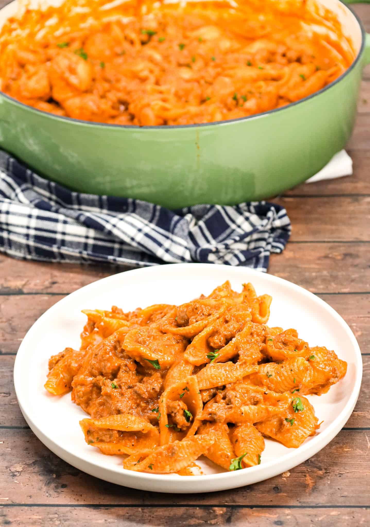 Creamy Beef and Shells is an easy ground beef pasta recipe with a creamy tomato sauce made with marinara, sour cream, heavy cream and shredded cheddar cheese.