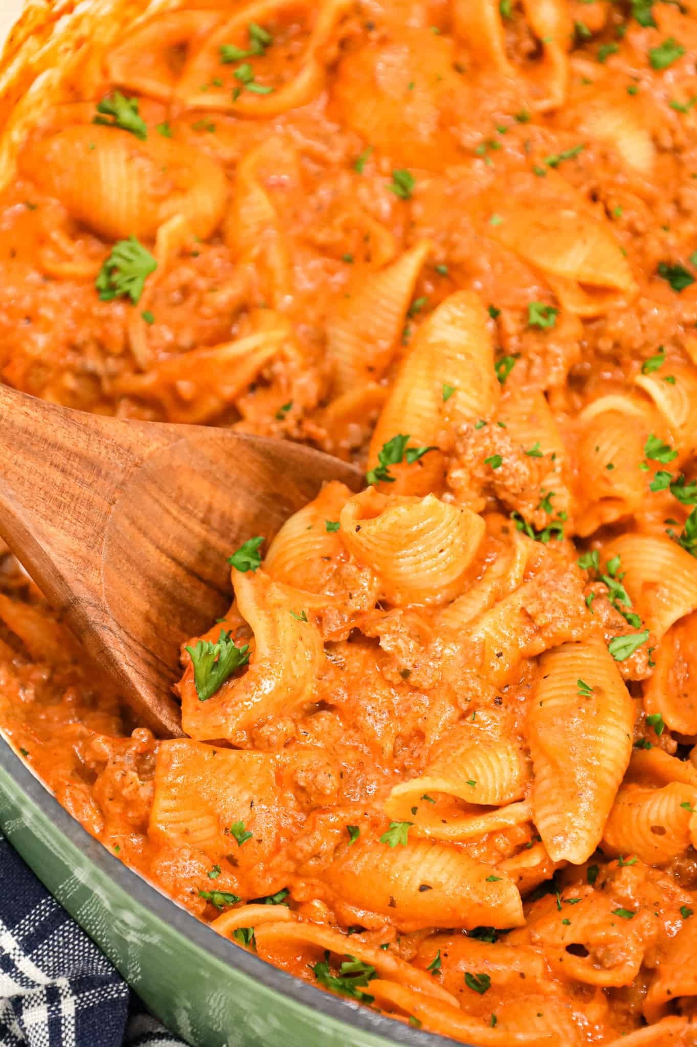 Creamy Beef and Shells is an easy ground beef pasta recipe with a creamy tomato sauce made with marinara, sour cream, heavy cream and shredded cheddar cheese.