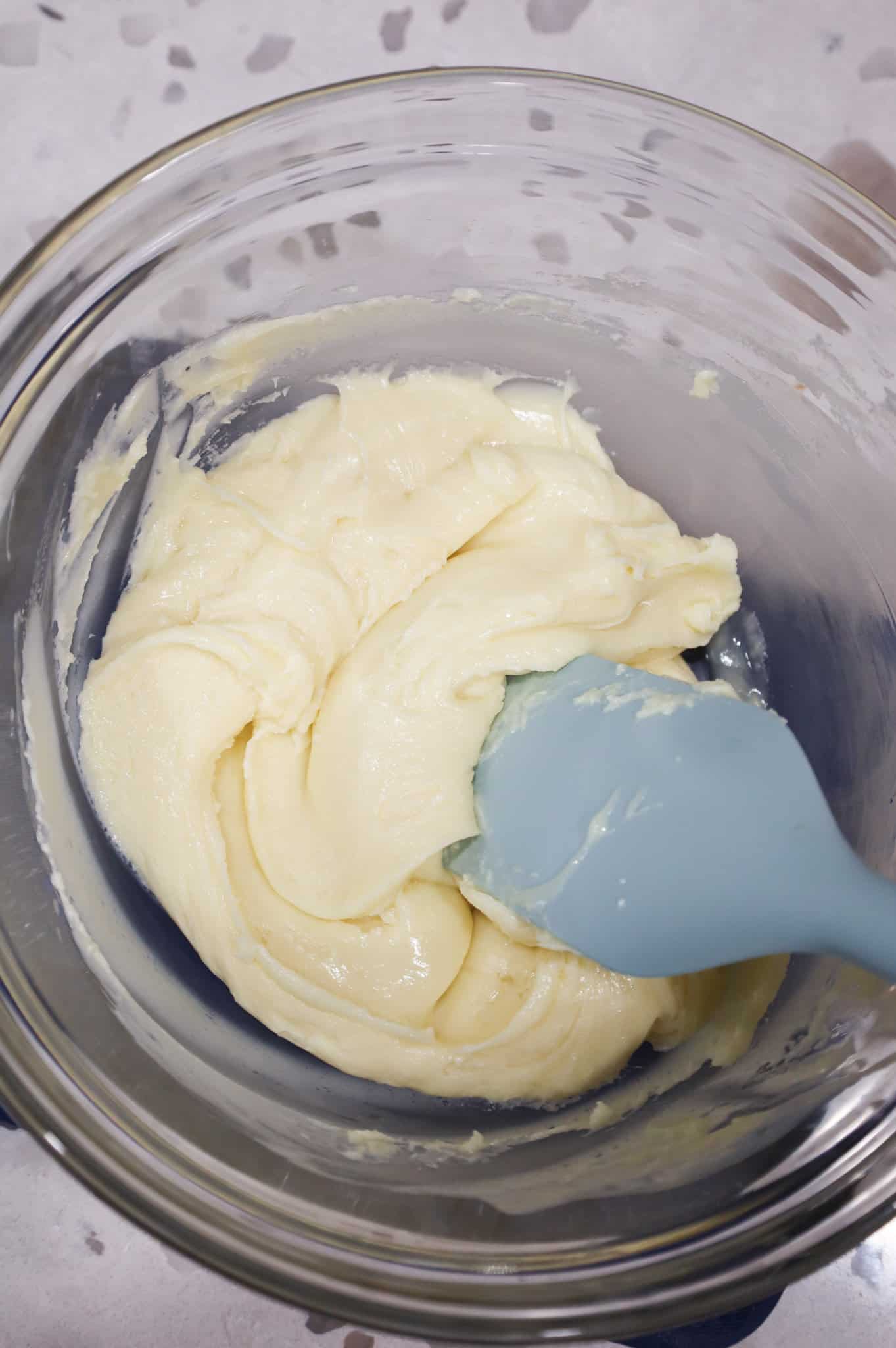 white chocolate mixture in a mixing bowl