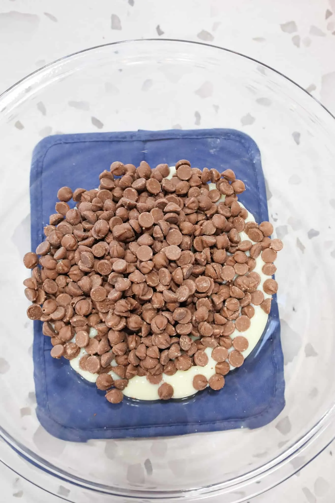 milk chocolate chips added to mixing bowl with milk chocolate chips