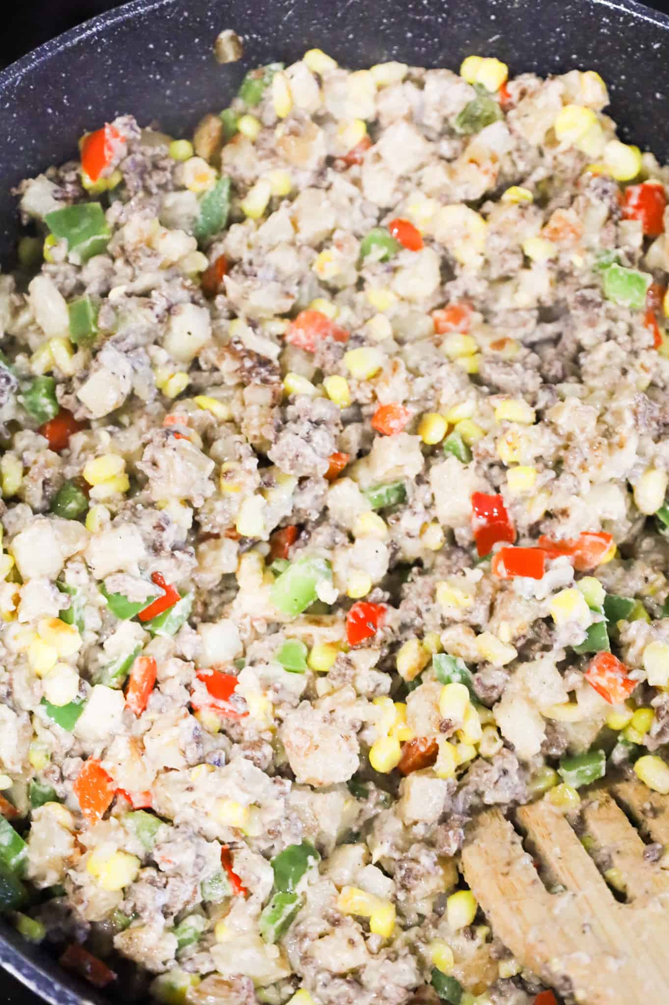 ground beef, potato and cream of mushroom soup mixture in a skillet