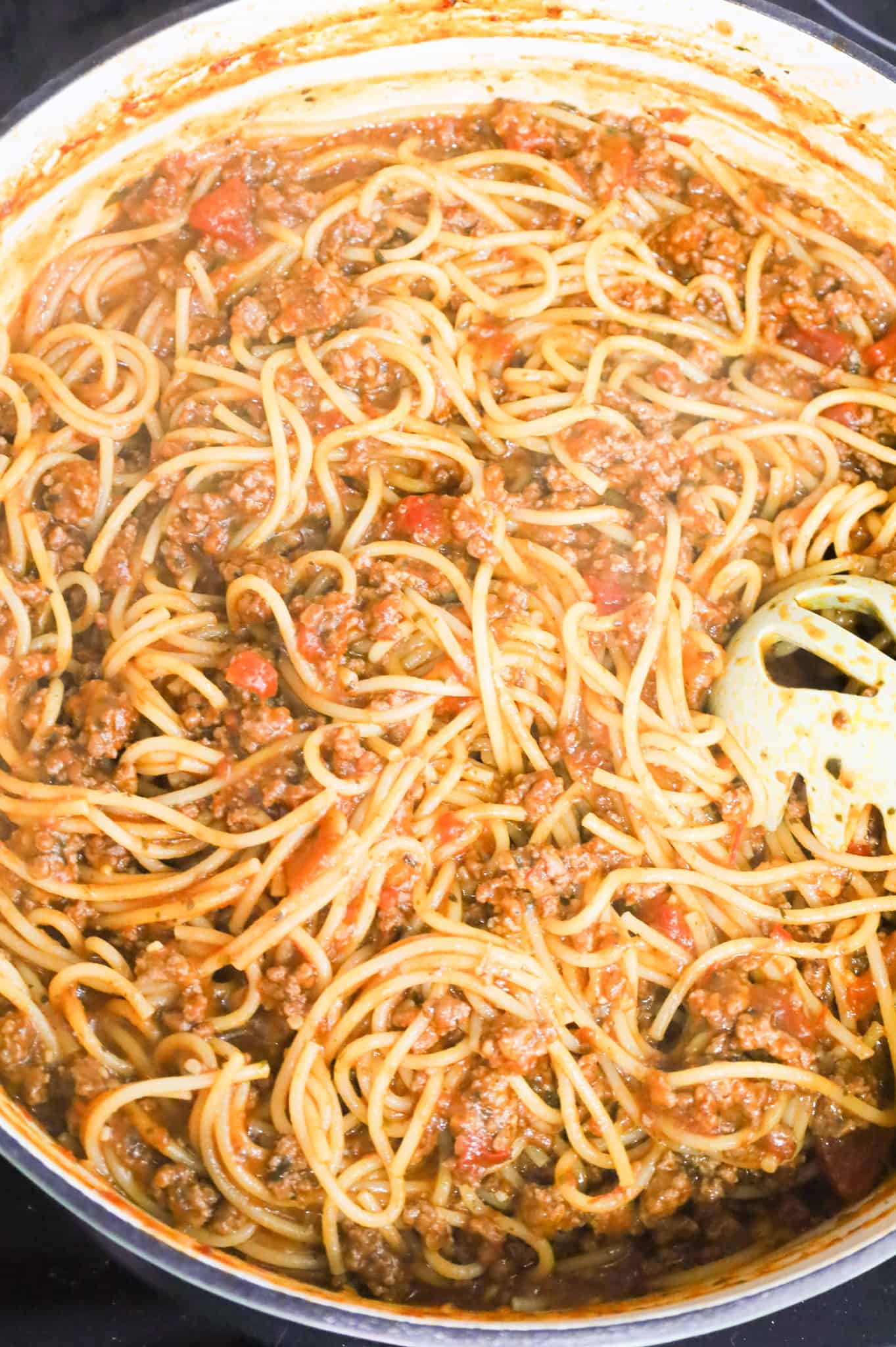 ground beef spaghetti mixture in a skillet