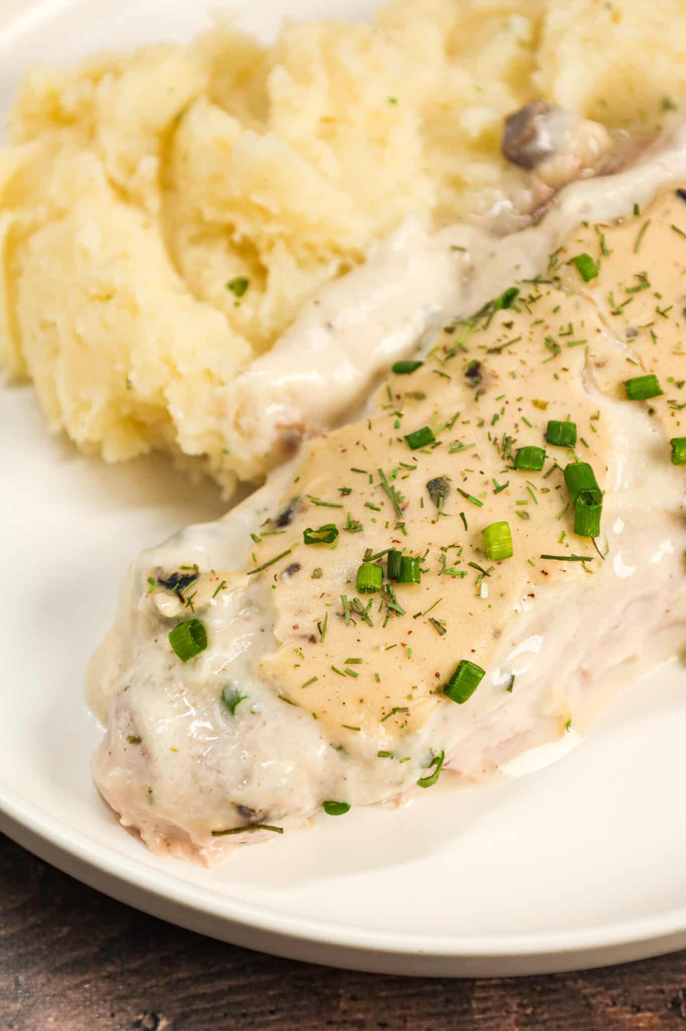 Ranch Pork Chops are an easy dinner recipe using boneless pork chops cooked in a creamy mixture of sour cream, cream of mushroom soup and ranch dressing mix.