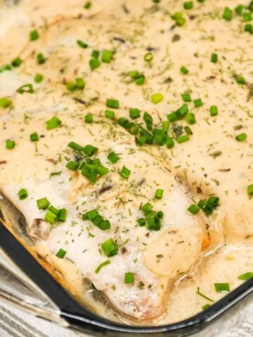 Ranch Pork Chops are an easy dinner recipe using boneless pork chops cooked in a creamy mixture of sour cream, cream of mushroom soup and ranch dressing mix.