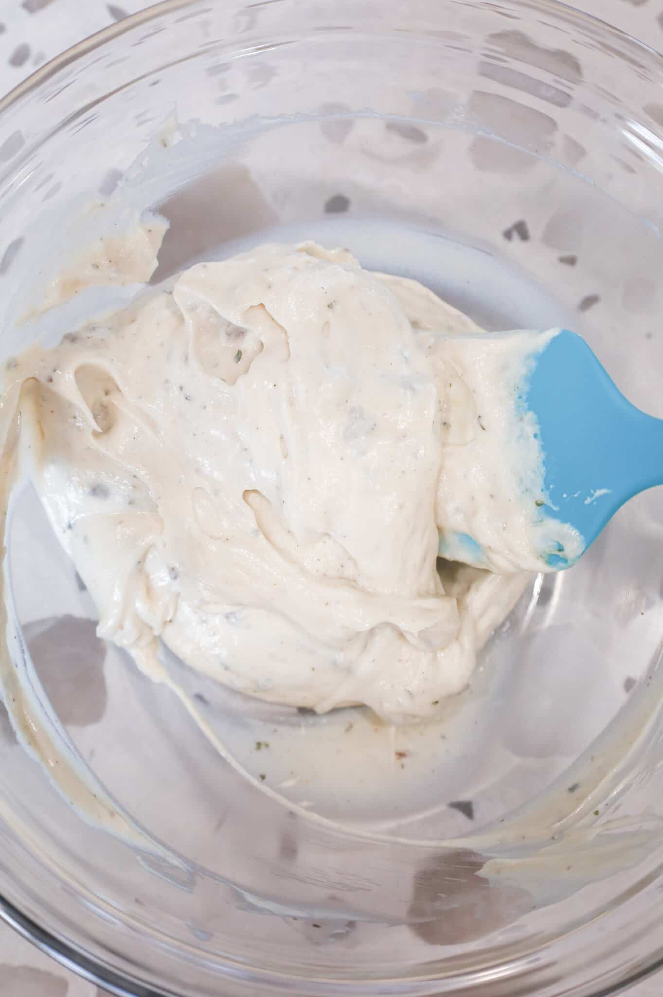 cream of mushroom soup, sour cream and ranch dressing mix mixture in a mixing bowl