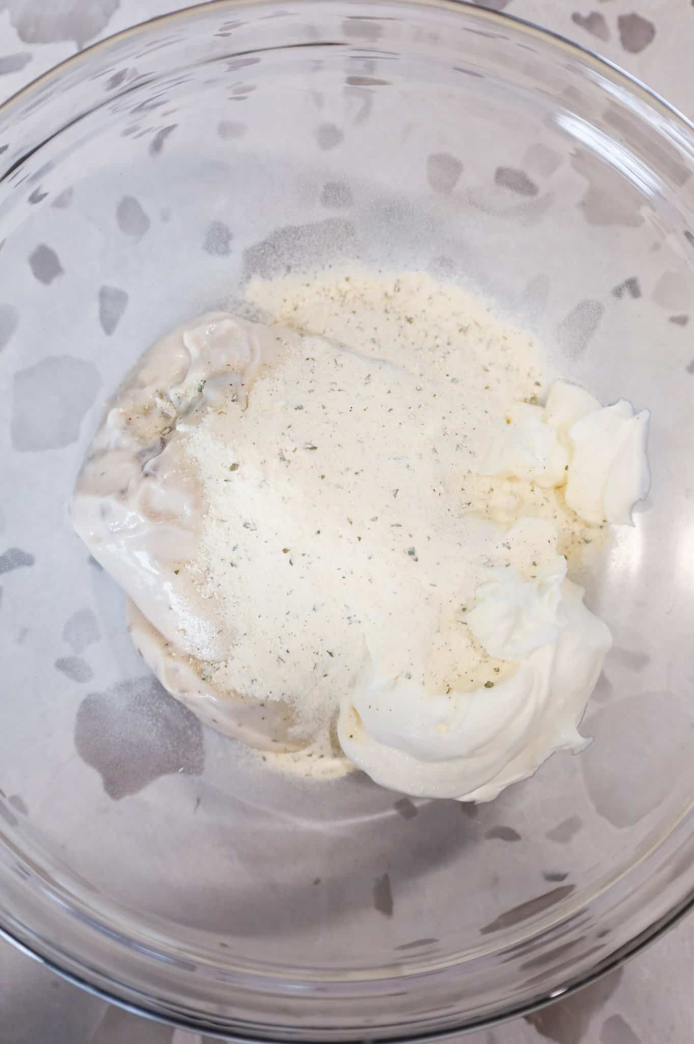 ranch dressing mix, sour cream and cream of mushroom soup in a mixing bowl