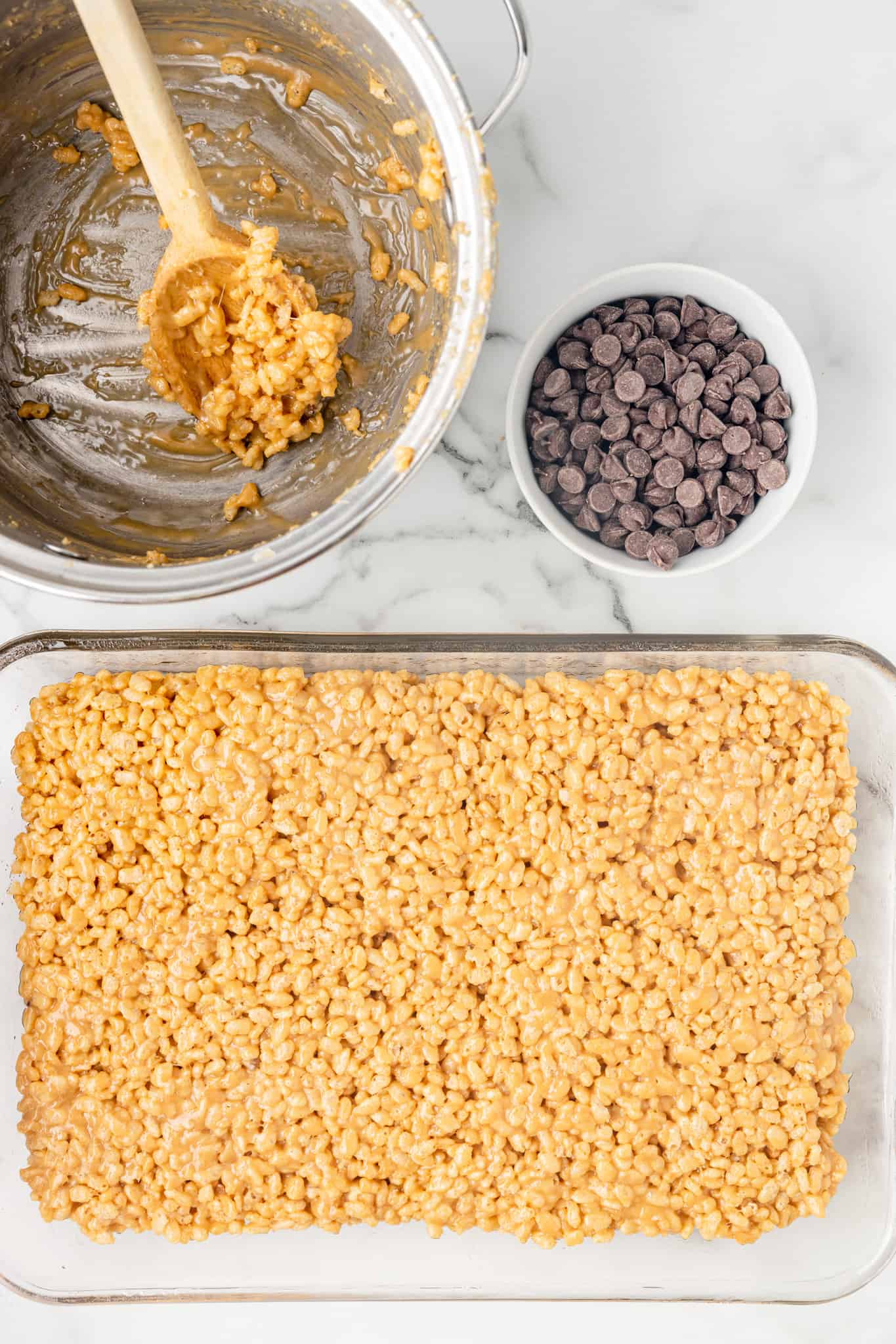 peanut butter rice krispie mixture pressed into a baking dish