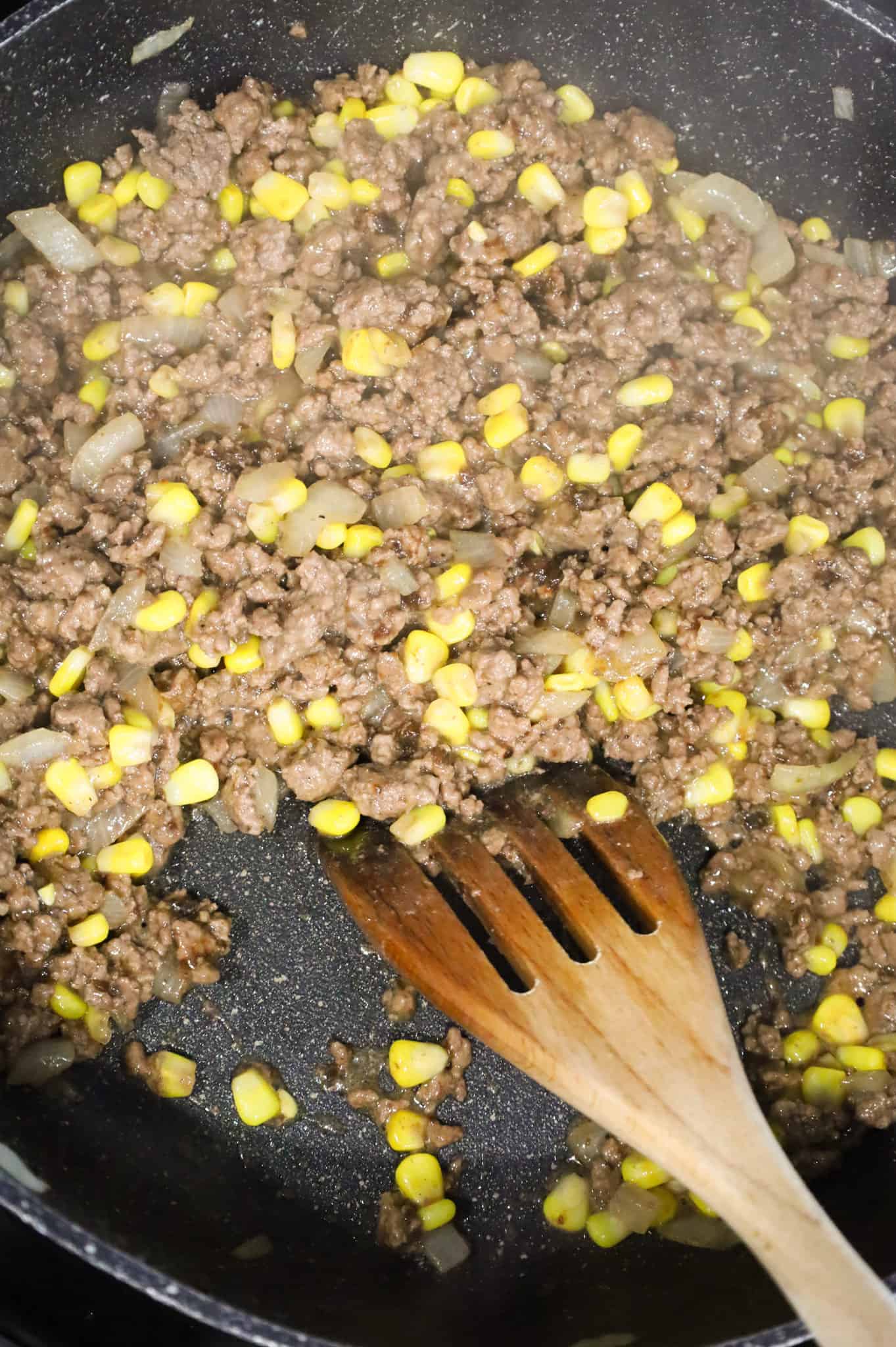 cooked ground beef and gravy mixture in a skillet