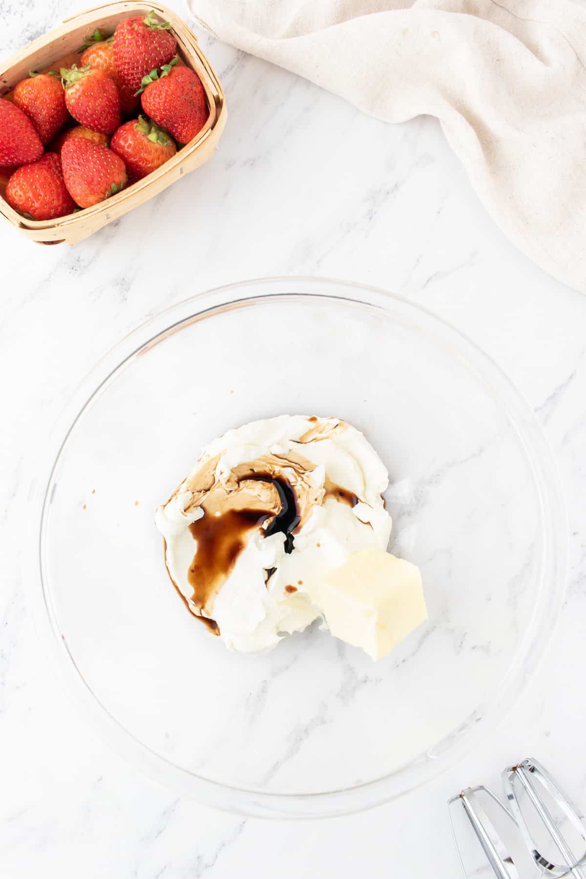 cream cheese, butter and vanilla extract in a mixing bowl