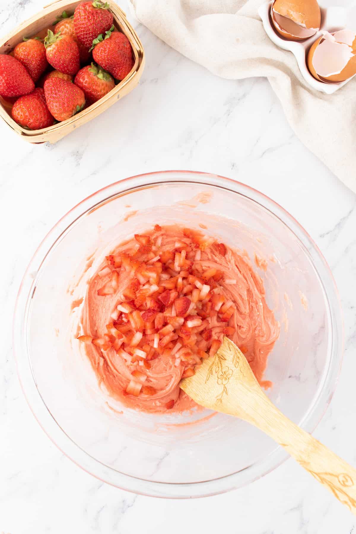 fresh chopped strawberries added to mixing bowl with strawberry cookie batter