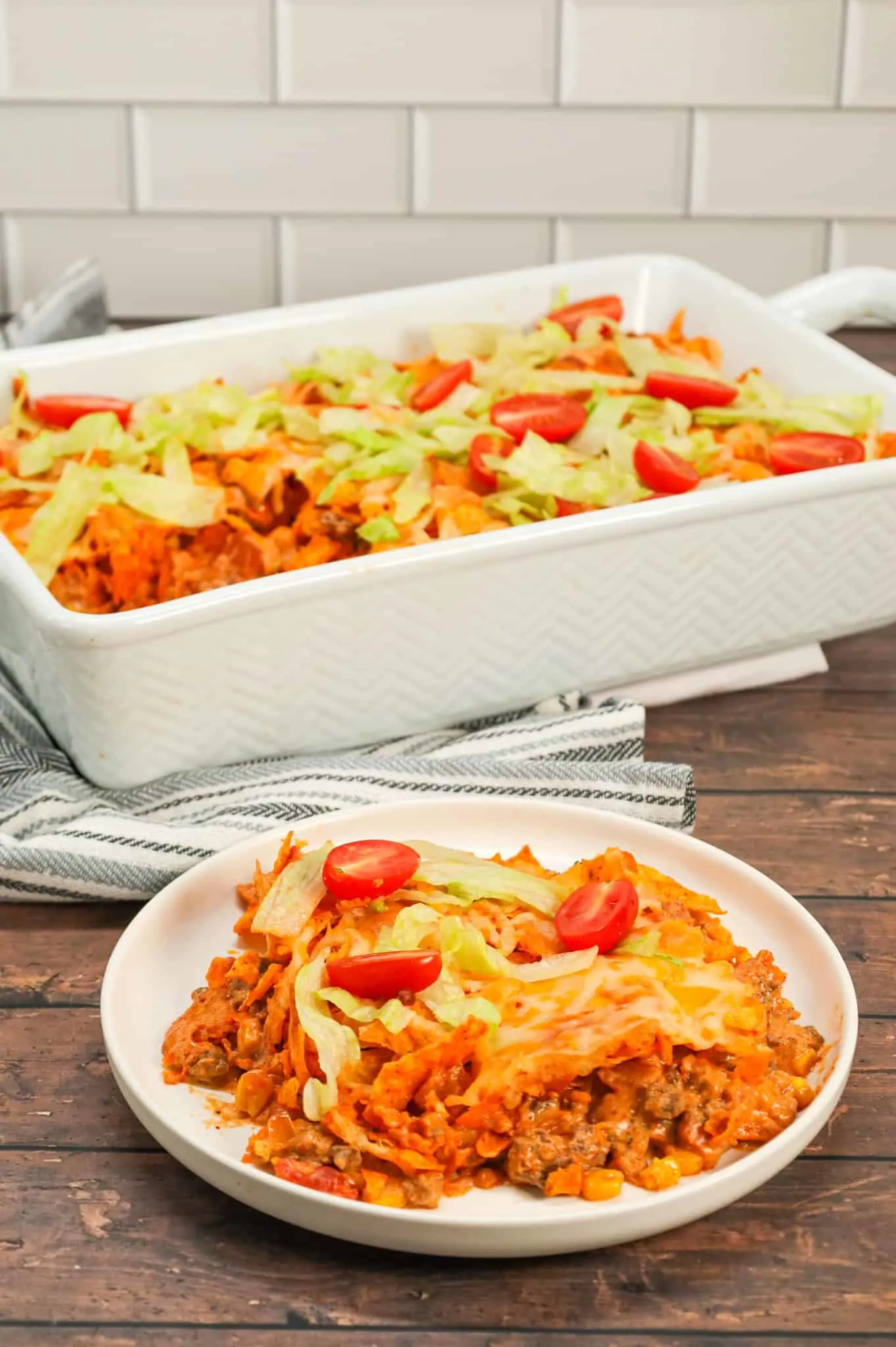 Taco Casserole with Doritos is an easy ground beef casserole recipe loaded with Rotel diced tomatoes and green chilies, salsa, cheddar cheese soup, corn, crumbled Doritos nacho chips and shredded cheese.