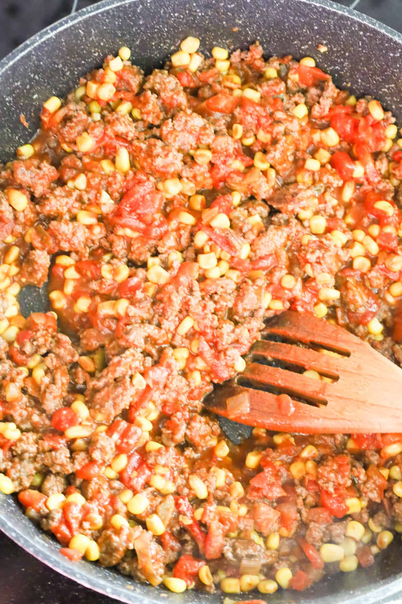 ground beef, rotel and corn mixture in a skillet