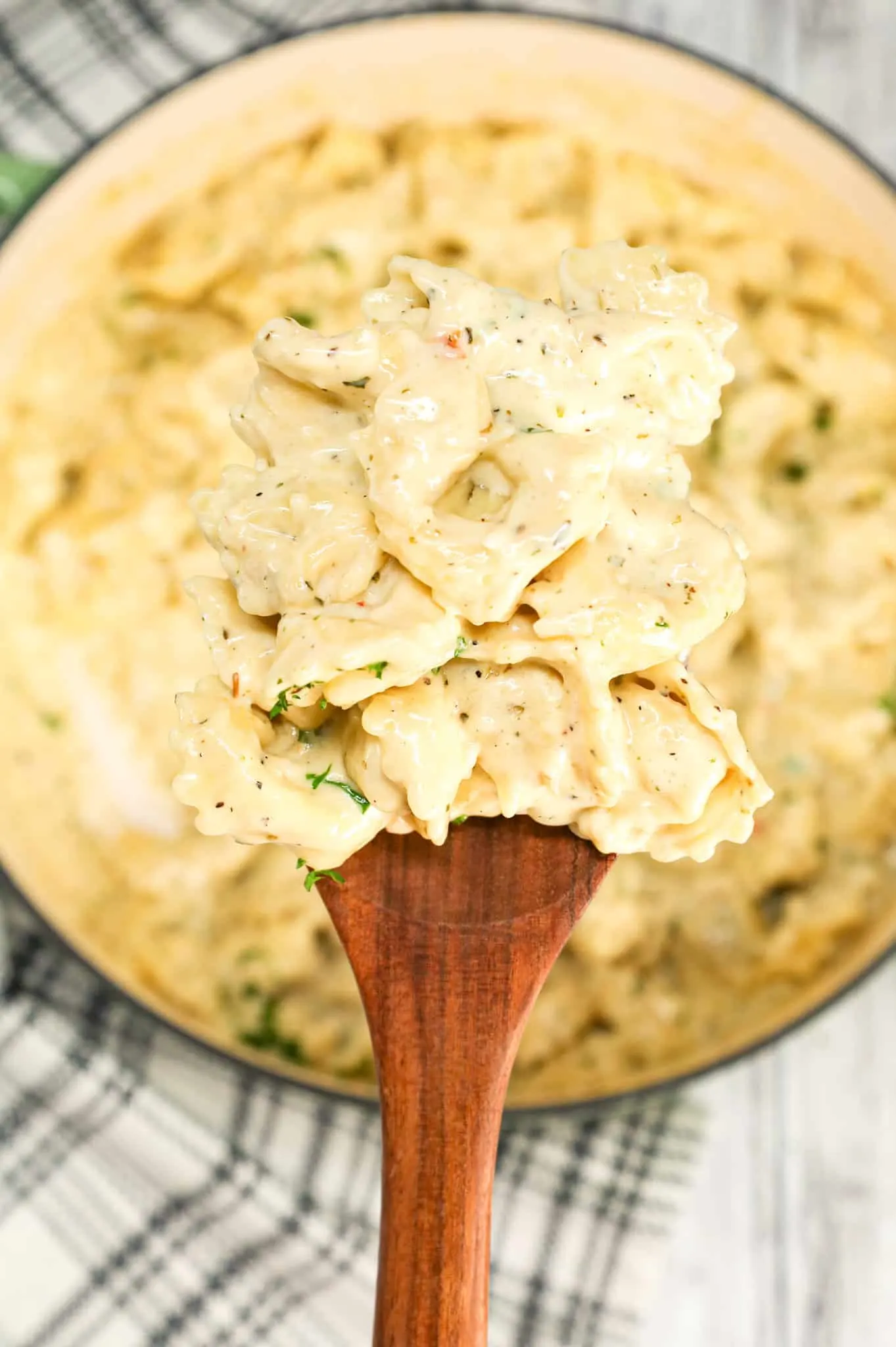 Tortellini Alfredo is a simple and delicious pasta recipe with cheese tortellini all tossed in a creamy garlic parmesan sauce.