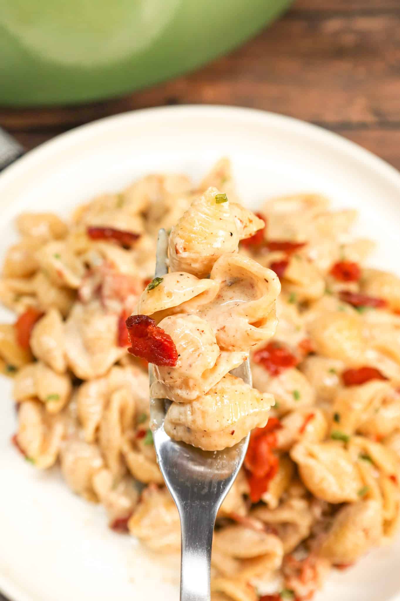 Bacon Pasta is a creamy shell pasta recipe loaded with crispy crumbled bacon pieces and flavoured with garlic and parmesan cheese.