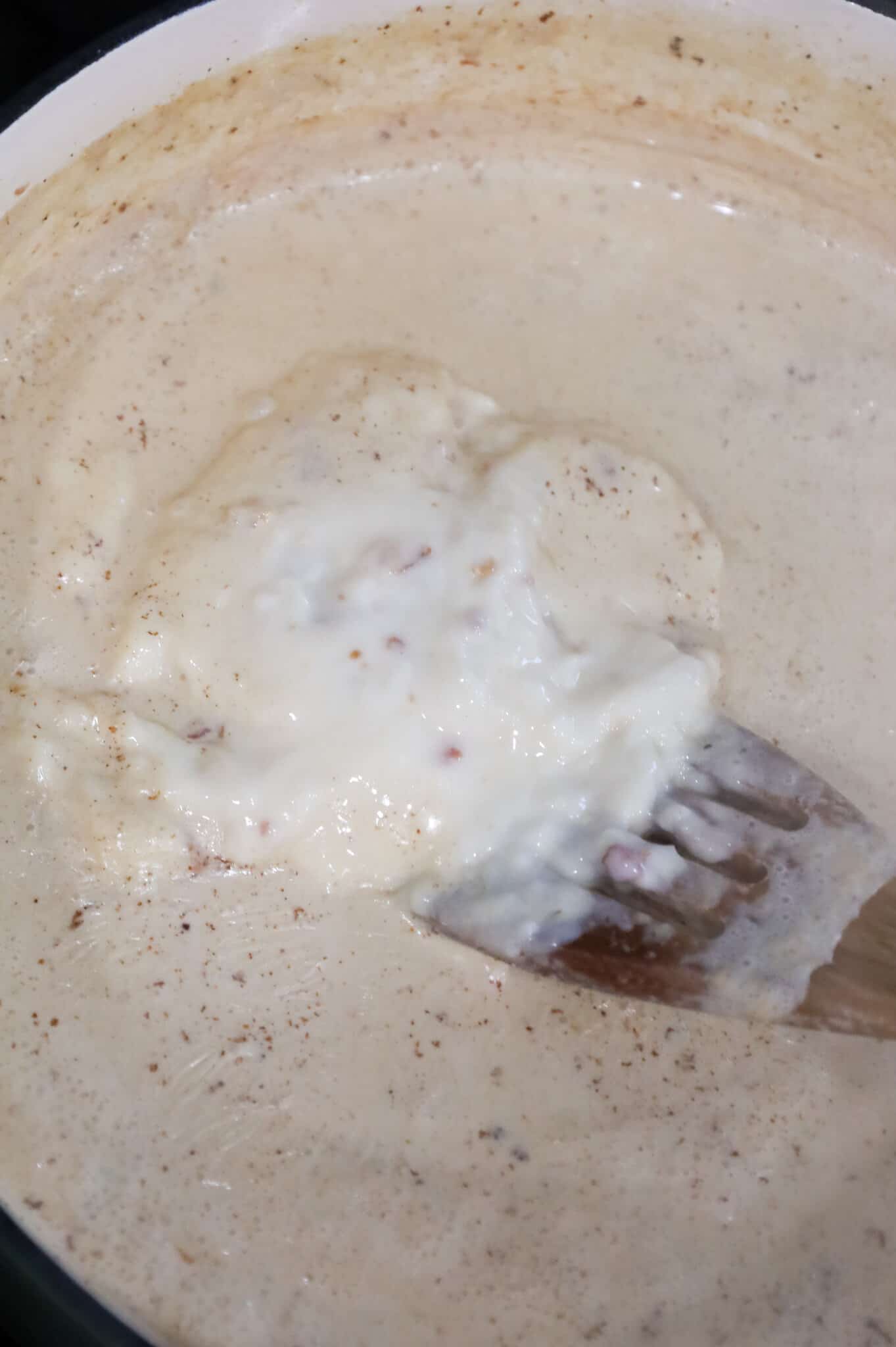 cream of bacon soup added to skillet with cream sauce