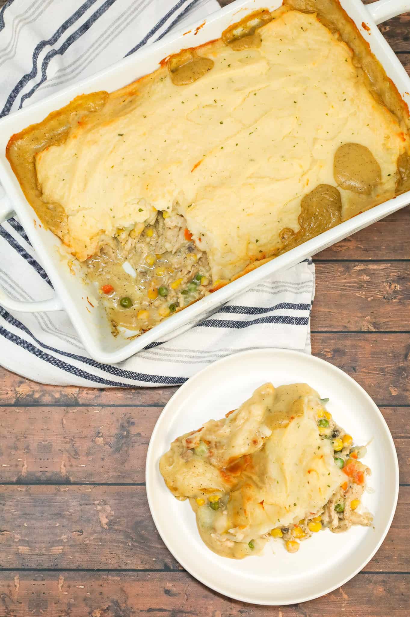 Chicken Shepherd's Pie is an easy dinner recipe loaded with shredded rotisserie chicken, mixed veggies, cream of mushroom soup and cream of chicken soup all baked with a layer of instant mashed potatoes on top.