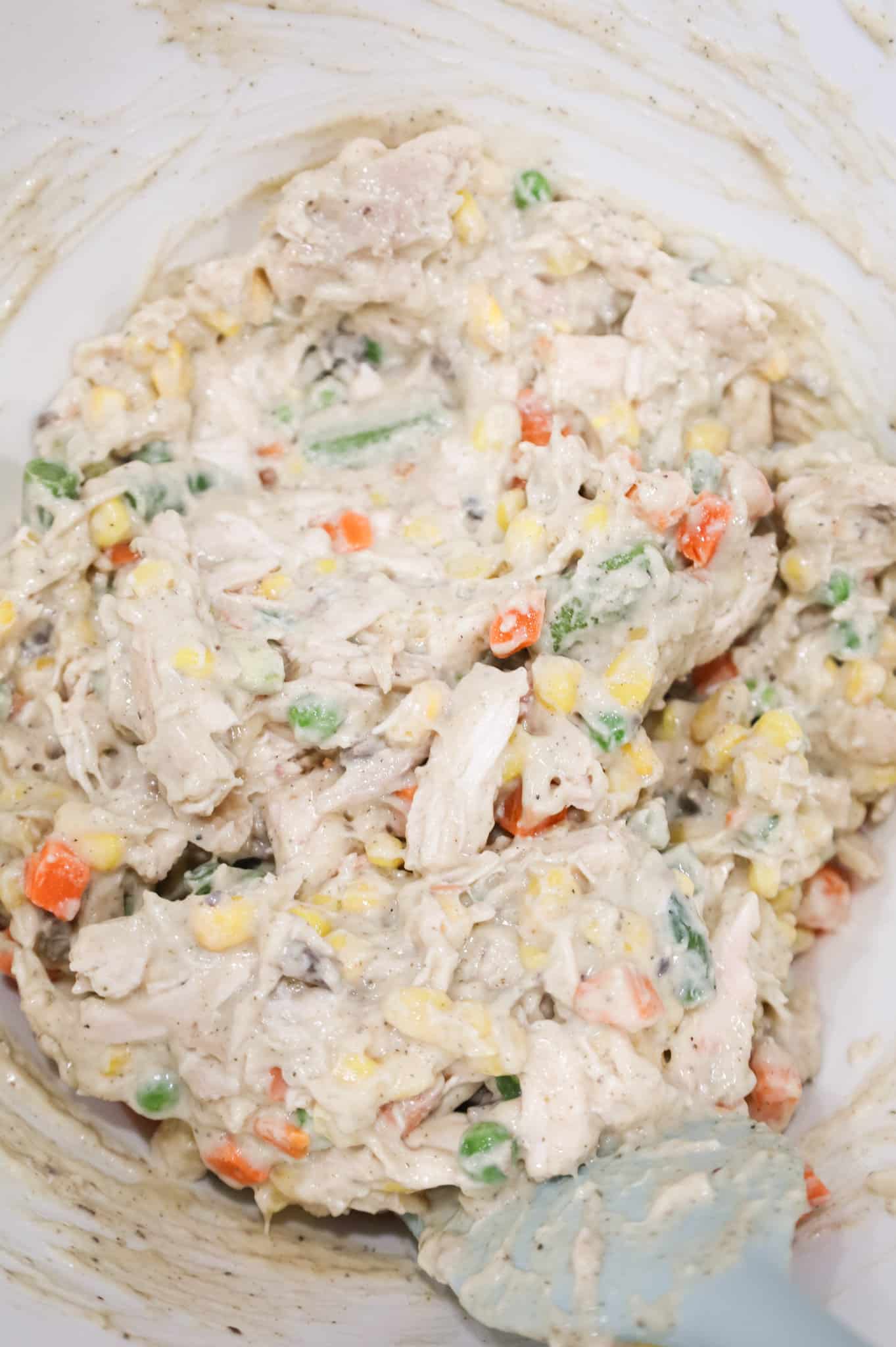 chicken, veggie and cream soup mixture in a mixing bowl